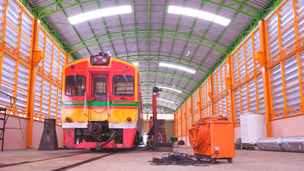 istock The old diesel train inside of workshop during maintenance and improvement wheels and suspension system in Ban Laem Railway Station at Samutsakhon, Thailand 1760420041