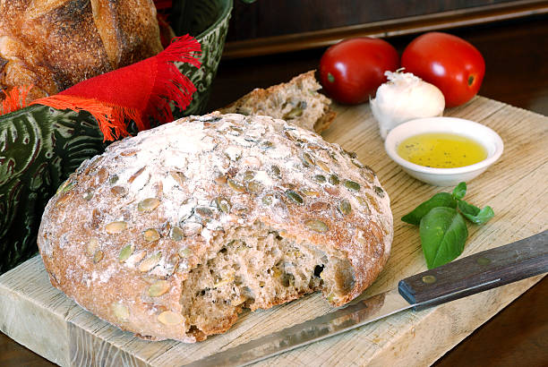 rustic bread with olive oil, garlic, and tomatoes stock photo