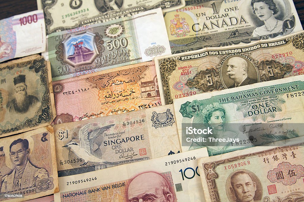 Paper Currency from around the world "Old paper currency money from world nations such as Canada, United States, Russia, Singapore, and other Asian and American countries." All Asian Currencies Stock Photo