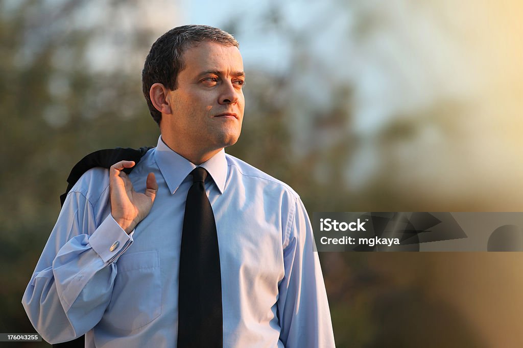 Businessman Portrait Businessman looking up towards the sunset. 30-39 Years Stock Photo
