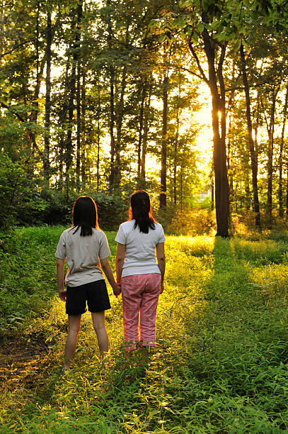 istock Mom and Daughter at Sunset 176043312