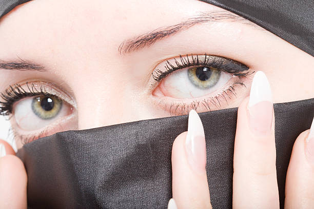 istock Green Eyes: Beautiful women wearing a Hijab 176043975