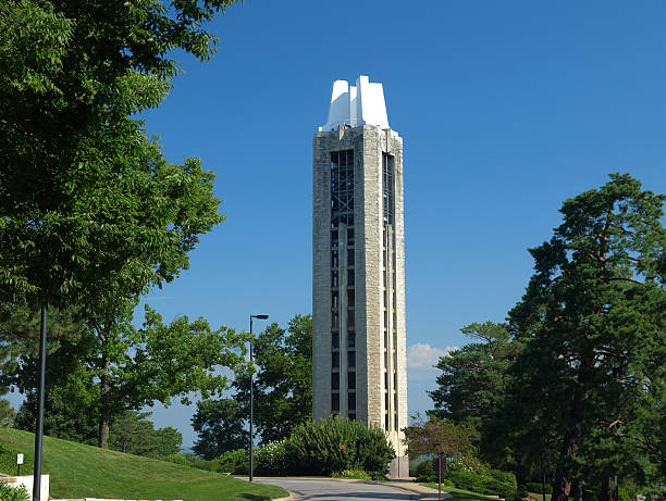 Memorial Campanile against clear blue sky World War II Memorial Campanile, University of Kansas, Lawrence, Kansas. lawrence kansas stock pictures, royalty-free photos & images