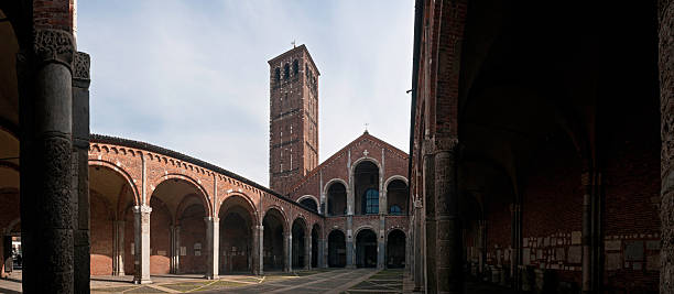 istock Milan Sant' Ambrogio basilica tranquil courtyard panorama Italy 176045947