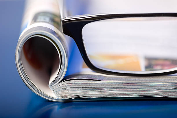 Magazine and glasses (composition)