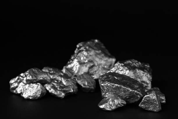 istock Pile of silver nuggets on black background, closeup 1760473748