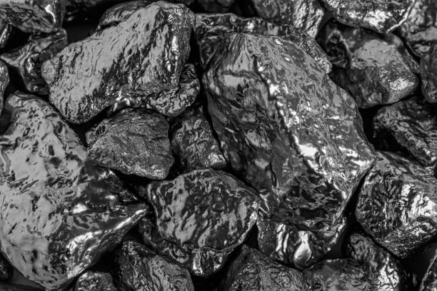 istock Pile of silver nuggets as background, top view 1760474509