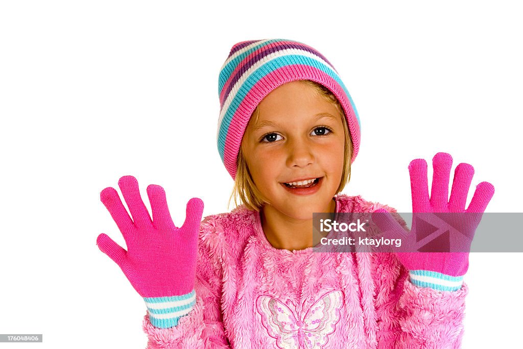 Pretty in Pink Cute little girl bundled up in pink gloves and hat 6-7 Years Stock Photo