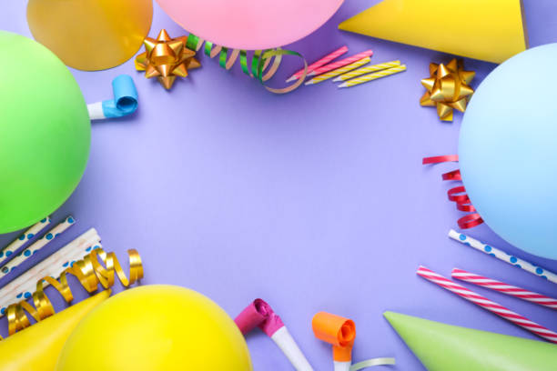 istock Frame of different accessories for birthday party on violet background, flat lay. Space for text 1760486664