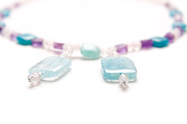 istock Blue and Purple Glass Bead Necklace on White Background 176049446