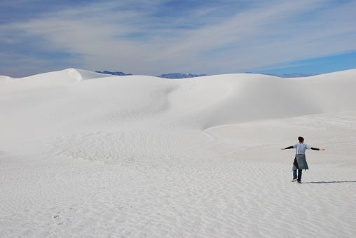 The dunes of White Sands National Park near Alamogordo, New Mexico with the mountains in the background.
