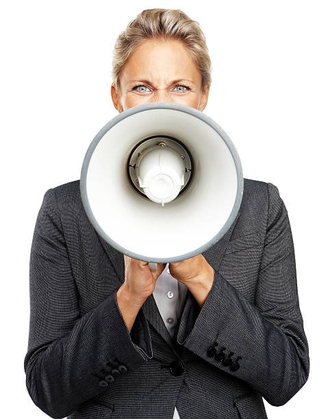 クローズアップのビジネスウーマンのメガ叫ぶ - complaining megaphone speech businesswoman ストックフォトと画像