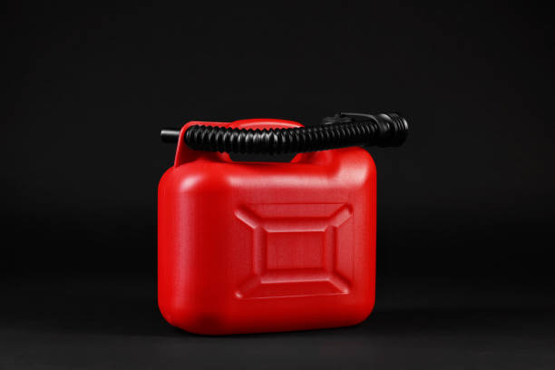 Fuel Pump Nozzle with Jerrycans. 3D Render
