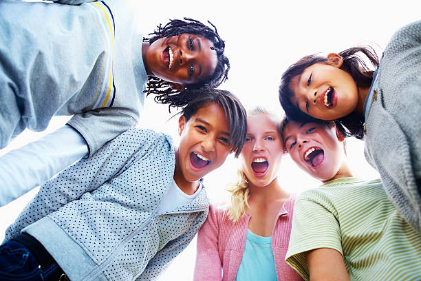 istock Low angle view of school children having fun 176050501