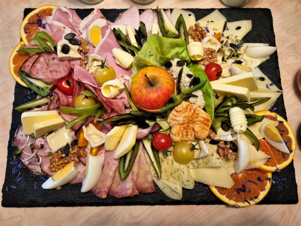 istock lavish, lovingly decorated typical austrian breakfast platter made of slate with sausages, cheese, ham, spreads, vegetables, fruits, nuts and seeds 1760505873