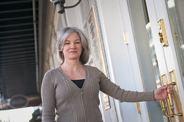 istock Woman Enters Hotel (XXL) 176051053