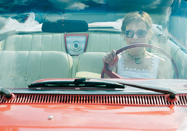 istock Woman in Antique Car 176051852