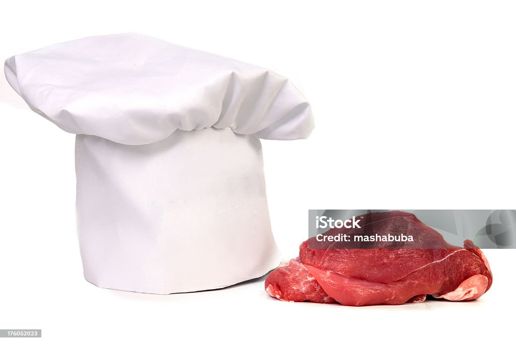 Cappello da cuoco e carne. - Foto stock royalty-free di Bianco