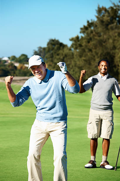 istock Golfer with clenched fist rejoicing 176052281