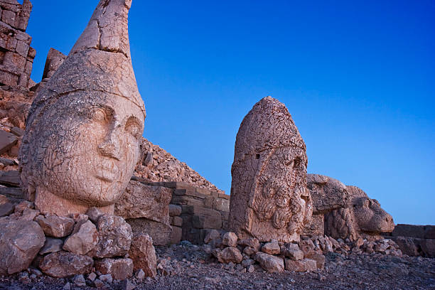 istock Ancient statue at Mount Nemrut in Turkey at dusk 176052911