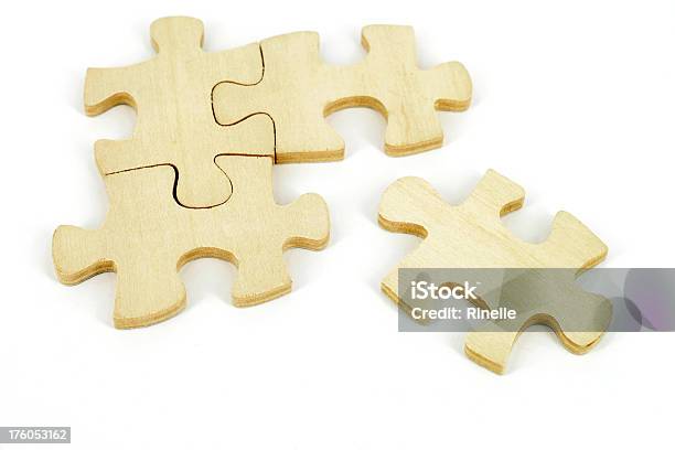 Putting The Puzzle Together Stock Photo - Download Image Now - Wood - Material, Jigsaw Piece, White Background