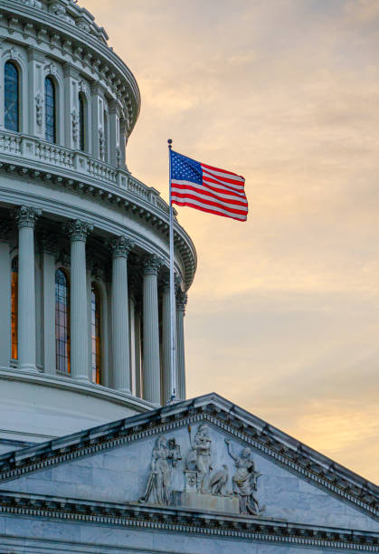 istock American flag at the Capitol in Washington DC 1760532369