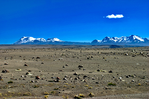 Arequipa Region, Peru.  May 17th 2006.  A barren plateau at around 5000 meters elevation along Route 109 in the Andes  mountains. The mountains in the background are Huarancante on the right side and Jello Jello on the left.