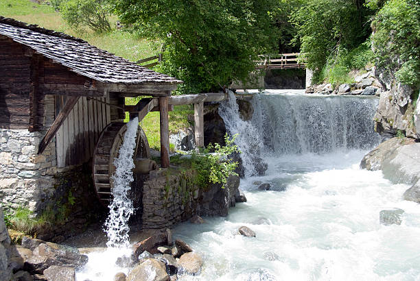 Idyllic Watermill Old r watermill. flour mill stock pictures, royalty-free photos & images