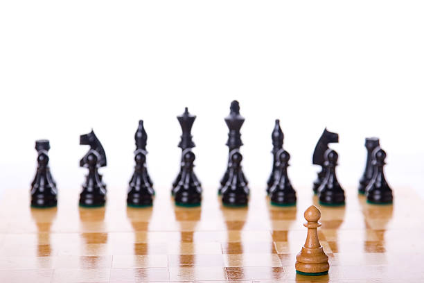 la scelta di uno - armed forces black yellow chess pawn foto e immagini stock