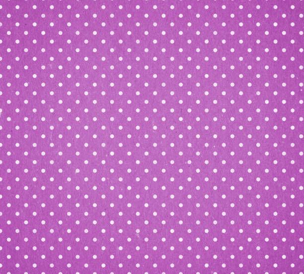 istock purple paper with white dots 176056203