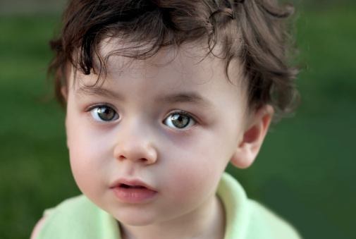 Close-up photo of a two-year-old little girl.