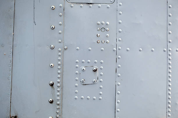 istock metal screw abstract background 176056771