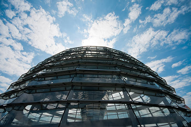 Cupola of the Reichstag (German parliament) in Berlin with blues sky and some whide clouds