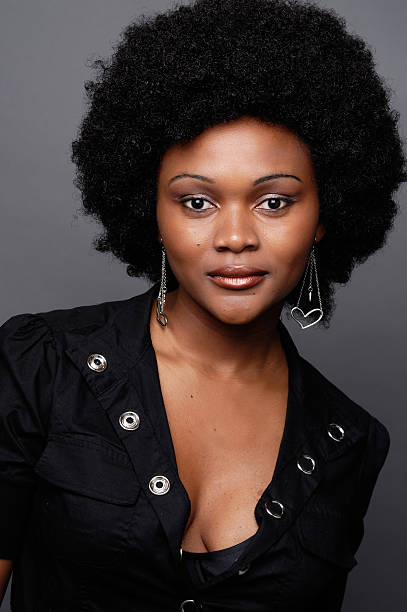 istock Black woman with afro hair 176057197