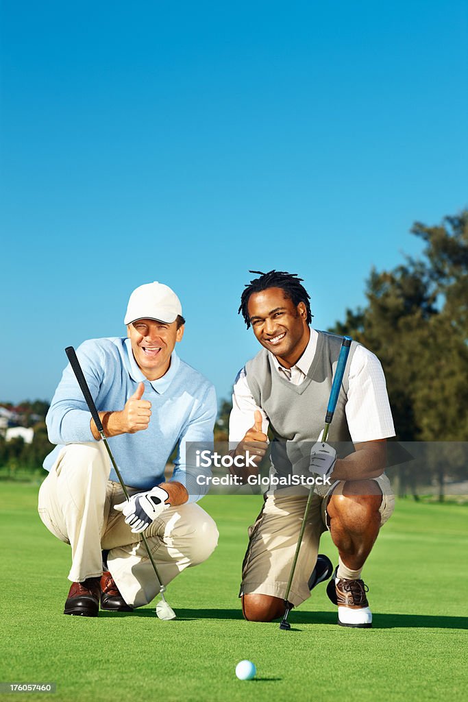 Jogadores profissionais, mostrando os polegares para cima - Foto de stock de Golfe royalty-free