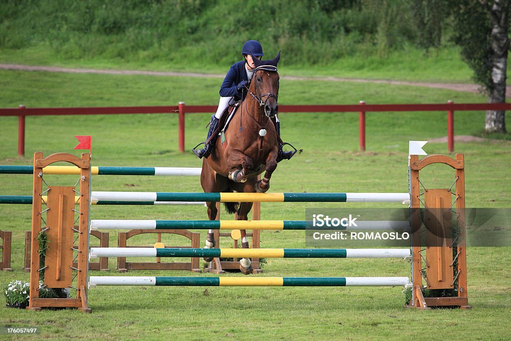 Show jumping competition Young woman partecipating in a show jumping competition in Norway- OTHER horse related photos: 18-19 Years Stock Photo