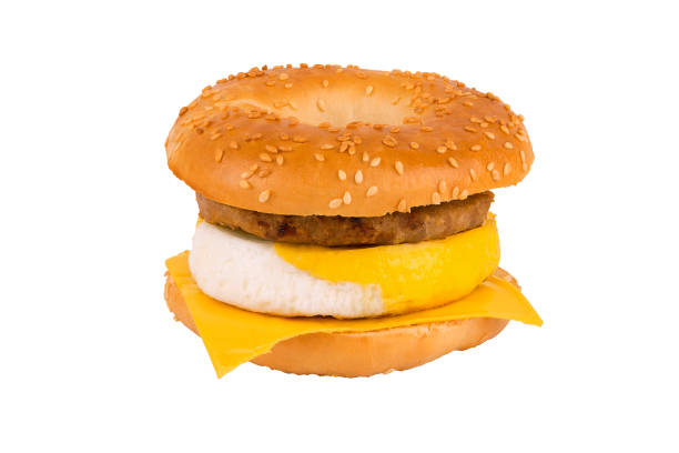 istock Sandwich breakfast isolated on white background. Bagel, egg, cheese, and sausage. 1760577647