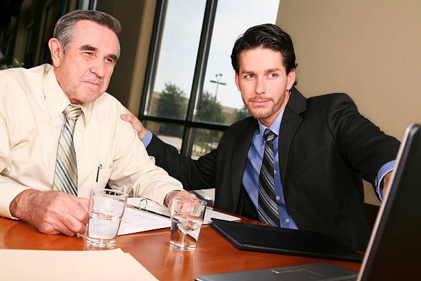 istock Business colleagues discussing something on a laptop 176058090
