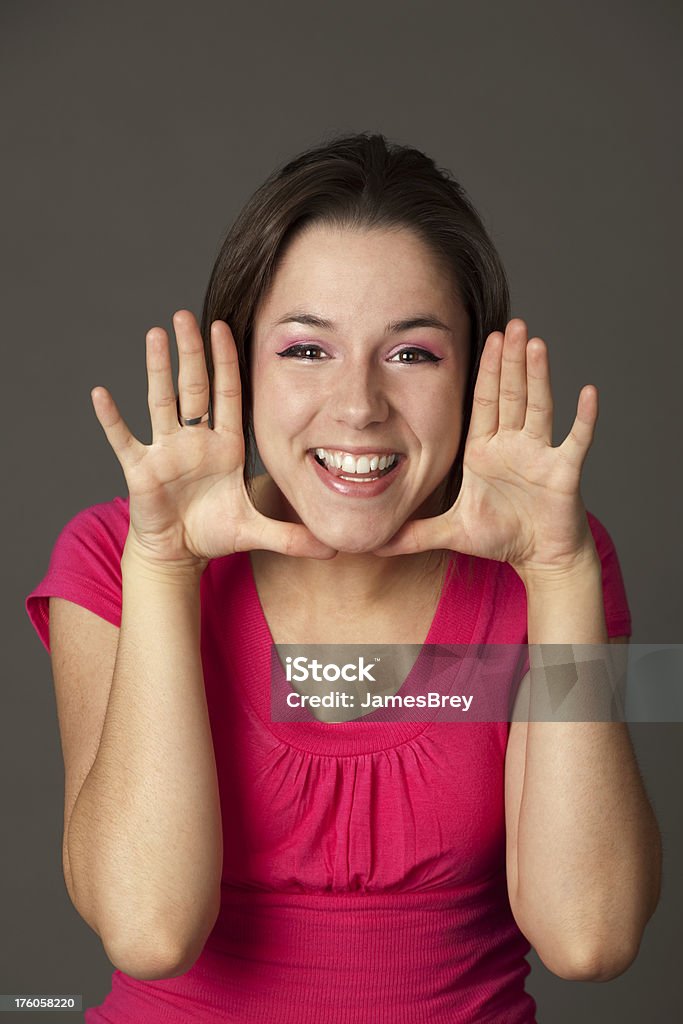 Pretty Girl With Great Big Fun Smile ,Hands Framing Face "Girl with great smile framing face with hands. This is a super-positive, happy image. Also see..." Adult Stock Photo