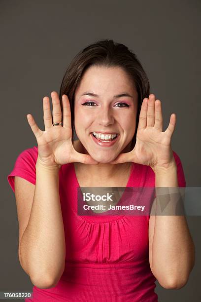 Pretty Girl With Great Big Fun Smile Hands Framing Face Stock Photo - Download Image Now