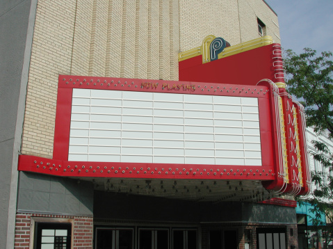 A photograph of a classic theater marquee.  Simply add you text.