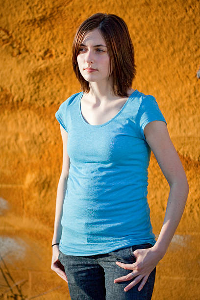 istock Girl Standing in Run Down Urban Area 176058384