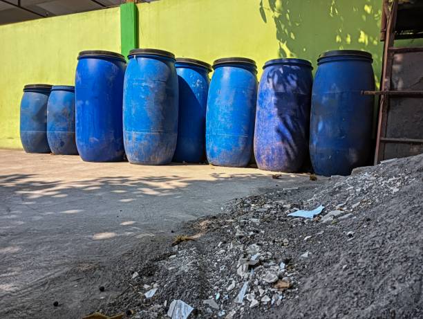 istock Many large blue trash bins are present. 1760583967