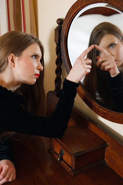 istock Woman And a Mirror 176058850