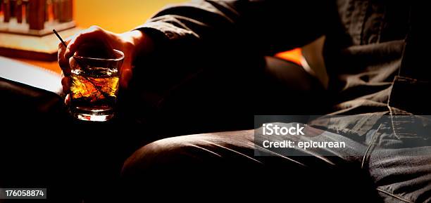Closeup Of A Man Drinking Alone Stock Photo - Download Image Now -  Cocktail, Cozy, Sofa - iStock
