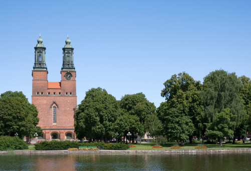 Tallinn, Estonia. July 2022.  The bell tower of St. Olav church in the city center