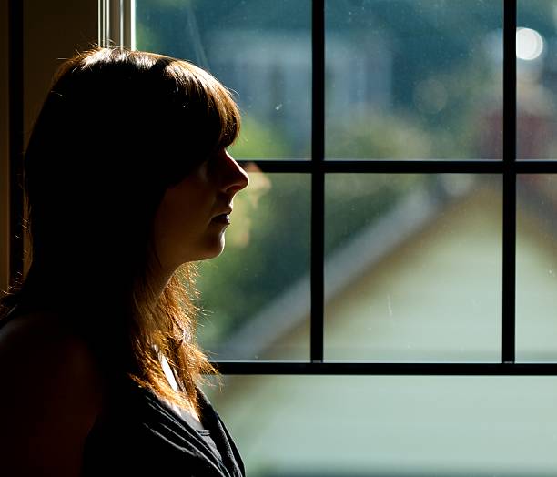istock Sad Woman in Silhouette 176060788