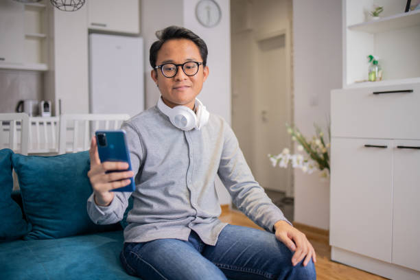 istock Portrait of a young man using smartphone 1760624983
