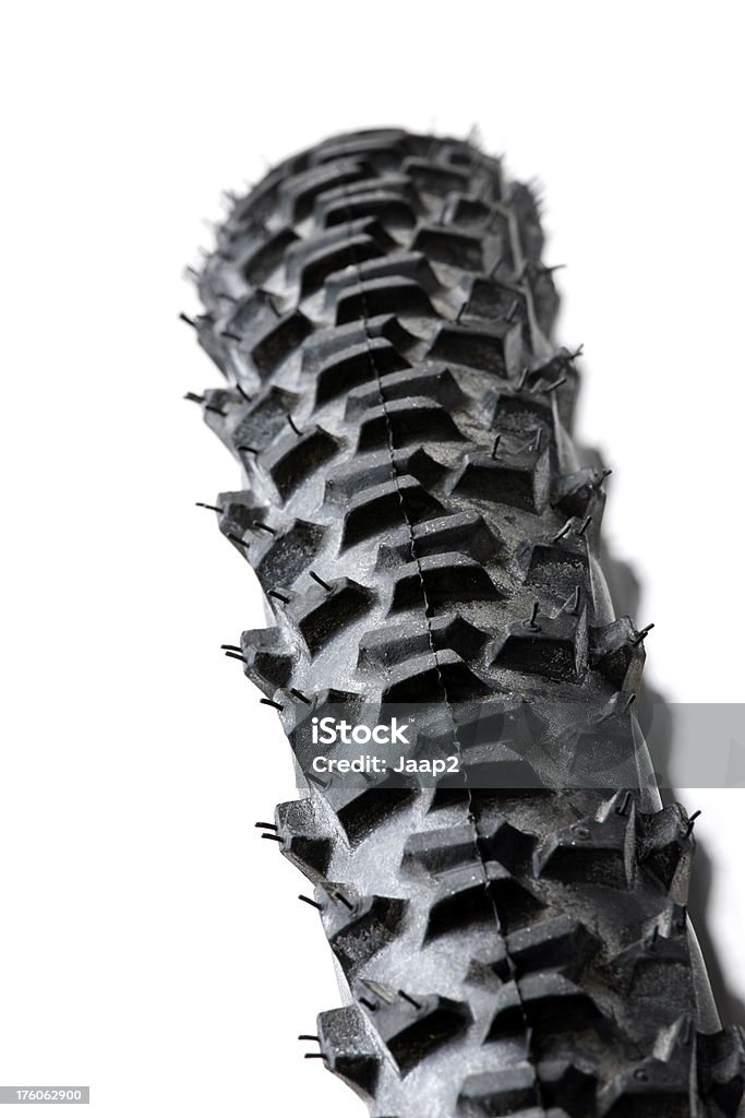 Mountain bike wheel "Close-up of a black mountain bike wheel as seen from above, against a white background. Shallow DOF !Canon 1Ds Mark III + 200 mm @ ISO 125, slightly cropped & downsizedsimilar images :" Tire - Vehicle Part Stock Photo