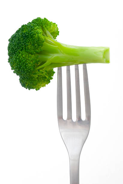 istock Vertical Shot of Broccoli on a fork 176062958